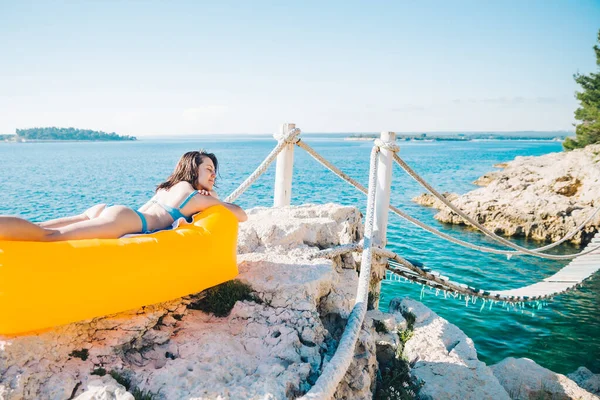 Smiling Woman Sea Beach Yellow Air Sofa Vacation Concept — Stock Photo, Image