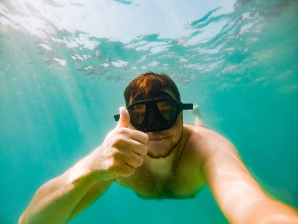 man in snorkeling mask underwater summer sea time