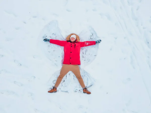 Overhead Top View Man Making Snow Angel Copy Space — Stock Photo, Image