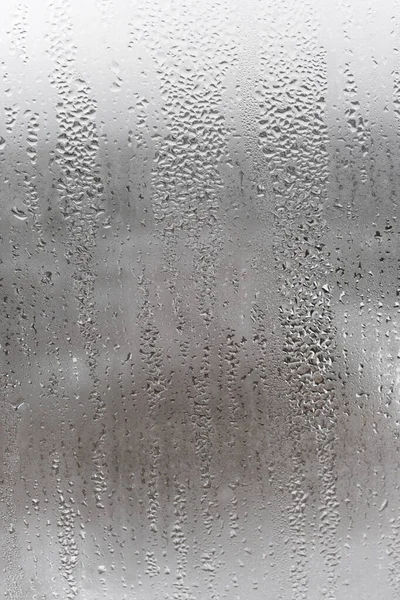 Schließen Sie Wassertropfen Auf Grauem Hintergrund Vernebeltes Glas Mit Wassertropfen — Stockfoto