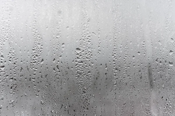 Natürliche Wassertropfen Fließen Durch Das Glas Hohe Luftfeuchtigkeit Raum Kondenswasser — Stockfoto