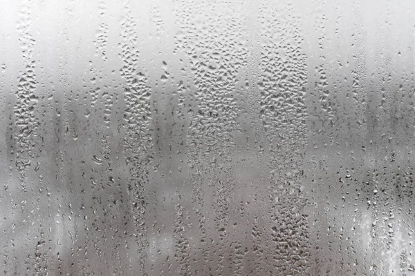 Natürliche Wassertropfen Fließen Durch Das Glas Hohe Luftfeuchtigkeit Raum Kondenswasser — Stockfoto