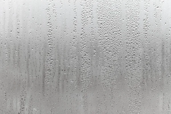 Schließen Sie Wassertropfen Auf Grauem Hintergrund Vernebeltes Glas Mit Wassertropfen — Stockfoto