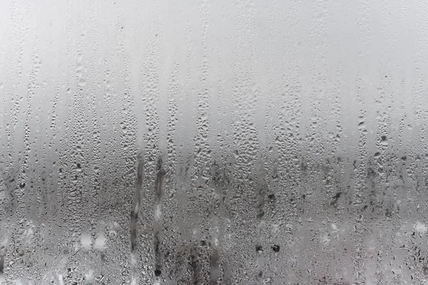 Chiudere Goccia Acqua Fondo Grigio Vetro Nebulizzato Con Goccioline Acqua — Foto Stock