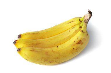 Üç sarı muz beyaz bir arkaplanda kapanıyor.