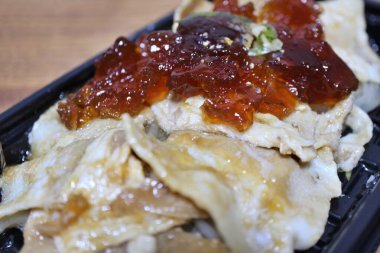 Tokyo, Japonya 'da bir süpermarketten alınmış Ponzu jöleli domuz göbeği.