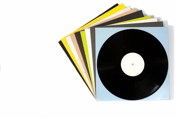 Bunte Schallplatten auf weißem Hintergrund — Stockfoto