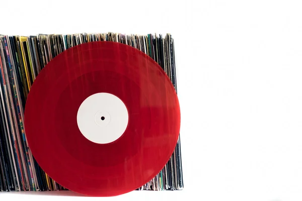 Rote Schallplatten auf weißem Hintergrund — Stockfoto