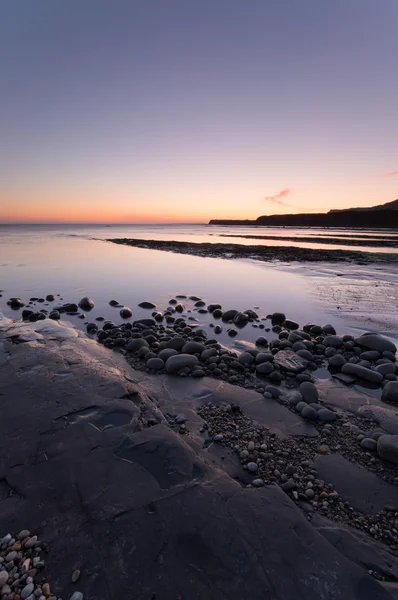 Sonnenuntergang in der kimmeridge bay — Stockfoto