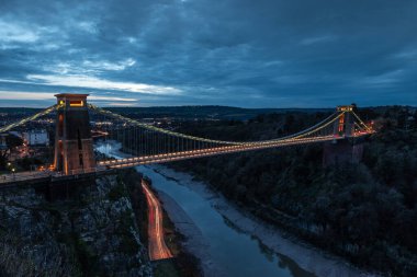 Clifton Suspension Bridge at sunset, with light trails from the vehicles.