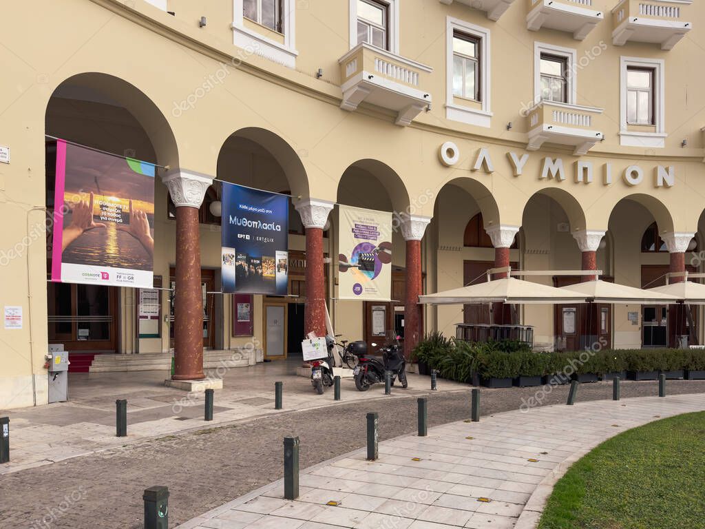 Thessaloniki, Greece - November 7, 2025: Arched facade of the Olympion building with 66th TIFF Thessaloniki International Festival along the plaza.
