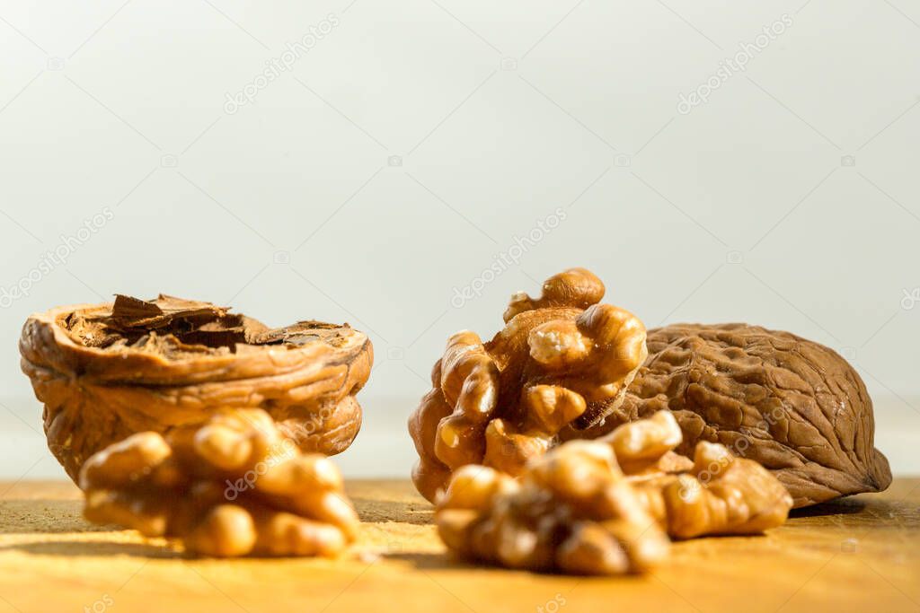 nuts on wood and white background for cooking