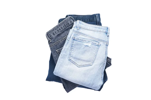 Eine Reihe Gefalteter Jeans Isoliert Auf Weißem Hintergrund Flache Lage — Stockfoto