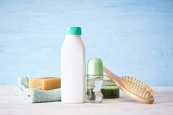 Bottle Shampoo Deodorant Soap Towel Wooden Background — Stock Photo, Image