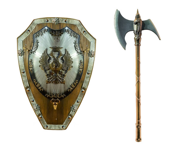 There are a battle ax and a shield. White background. Isolated.