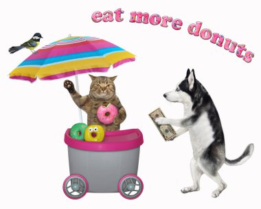 Gri hareketli bir büfeden köpek köpeğinin biri donut alıyor. Beyaz arka plan. İzole edilmiş.