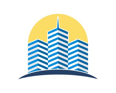 Arkasında gündoğumu olan bir emlak binası.