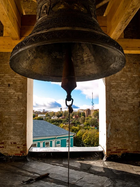Large brass bell in the bell tower of the temple
