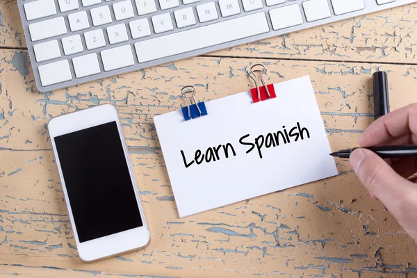 Nota de papel com texto aprender espanhol — Fotografia de Stock