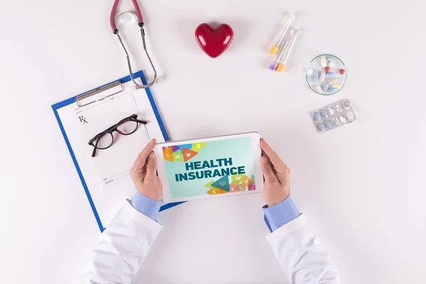 Doctor holding digital tablet — Stock Photo, Image