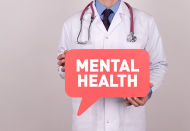 Konuşma balonu tutan doktor