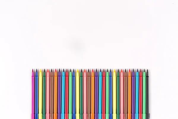 Felt pens lying in row — Stock Photo, Image