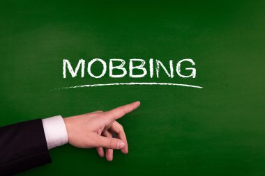 Mobbing üzerinde işaret eden işadamı