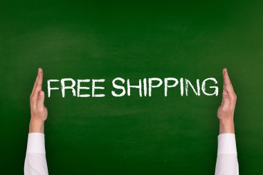 Yazı tahtası üzerinde gösterilen eller