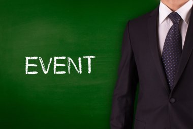 Blackboard karşı ayakta işadamı