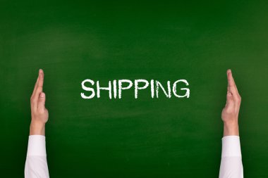 Yazı tahtası üzerinde gösterilen eller