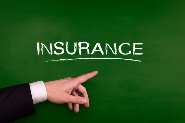 Businessman pointing on insurance — Stock Photo, Image