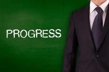 Blackboard karşı ayakta işadamı
