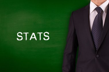 Blackboard karşı ayakta işadamı