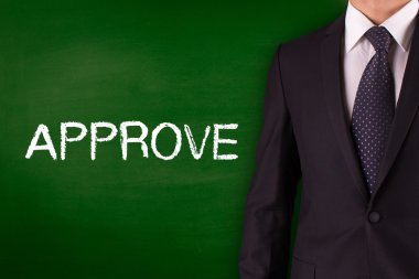 Blackboard karşı ayakta işadamı