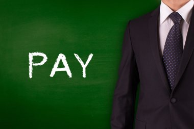 Blackboard karşı ayakta işadamı