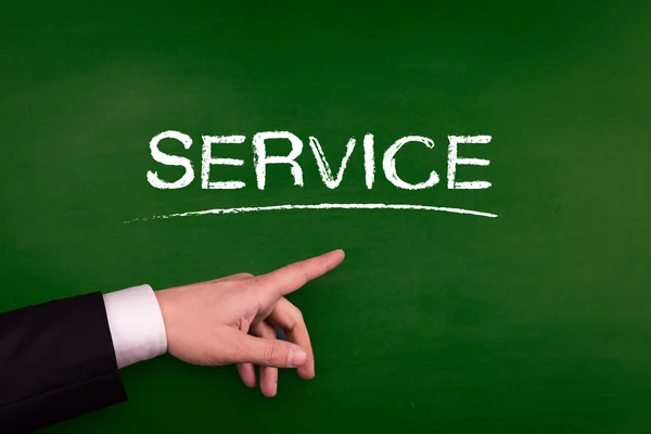 Businessman pointing on service — Stock Photo, Image