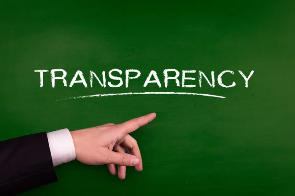 Empresario que apunta a la transparencia — Foto de Stock