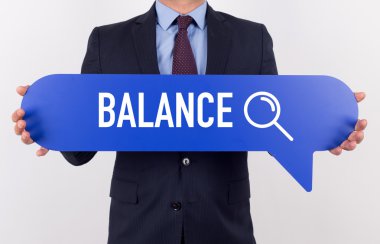 konuşma balonu tutan işadamı