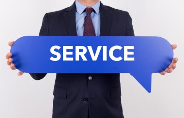 konuşma balonu tutan işadamı