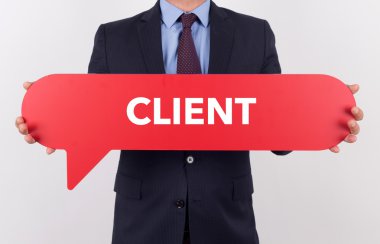 konuşma balonu tutan işadamı