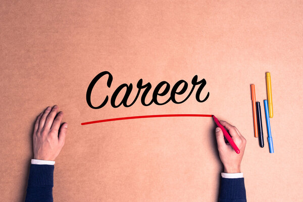 Hand writing text on paper