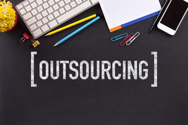 Outsourcing text napsaný — Stock fotografie