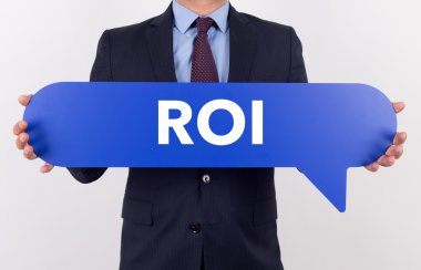 konuşma balonu tutan işadamı