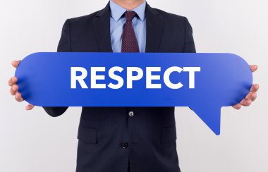 konuşma balonu tutan işadamı