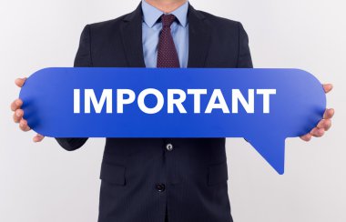 konuşma balonu tutan işadamı