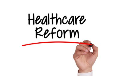 İnsan eli beyaz tahta üzerinde yazma