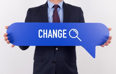 konuşma balonu tutan işadamı