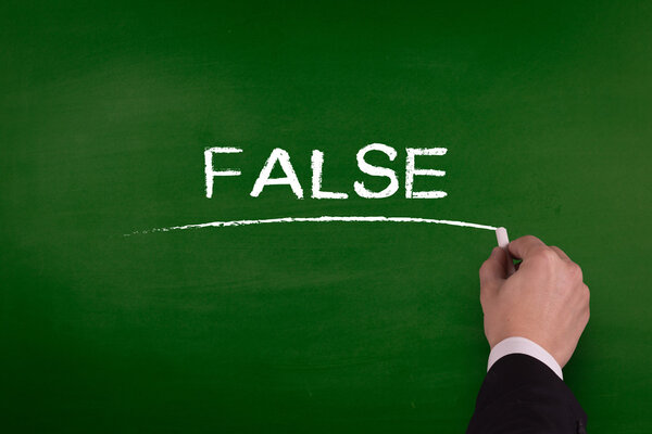 businessman writing on blackboard