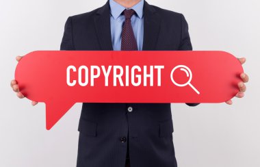 konuşma balonu tutan işadamı