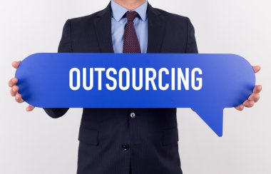 konuşma balonu tutan işadamı